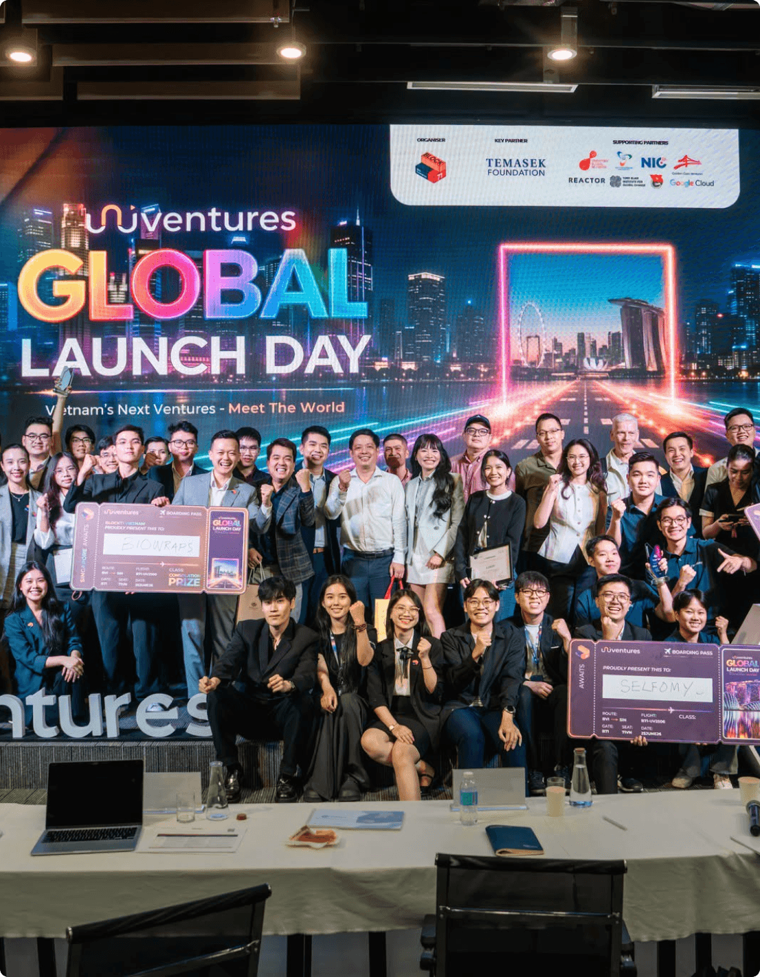 Founders and students celebrating on stage at a Global Launch Day event